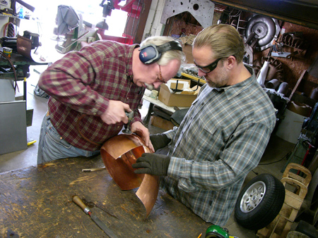 Fay Butler and Jesse James knocking down the welds slightly