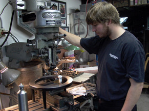 Will Gillmore milling parts for an air planishing hammer
